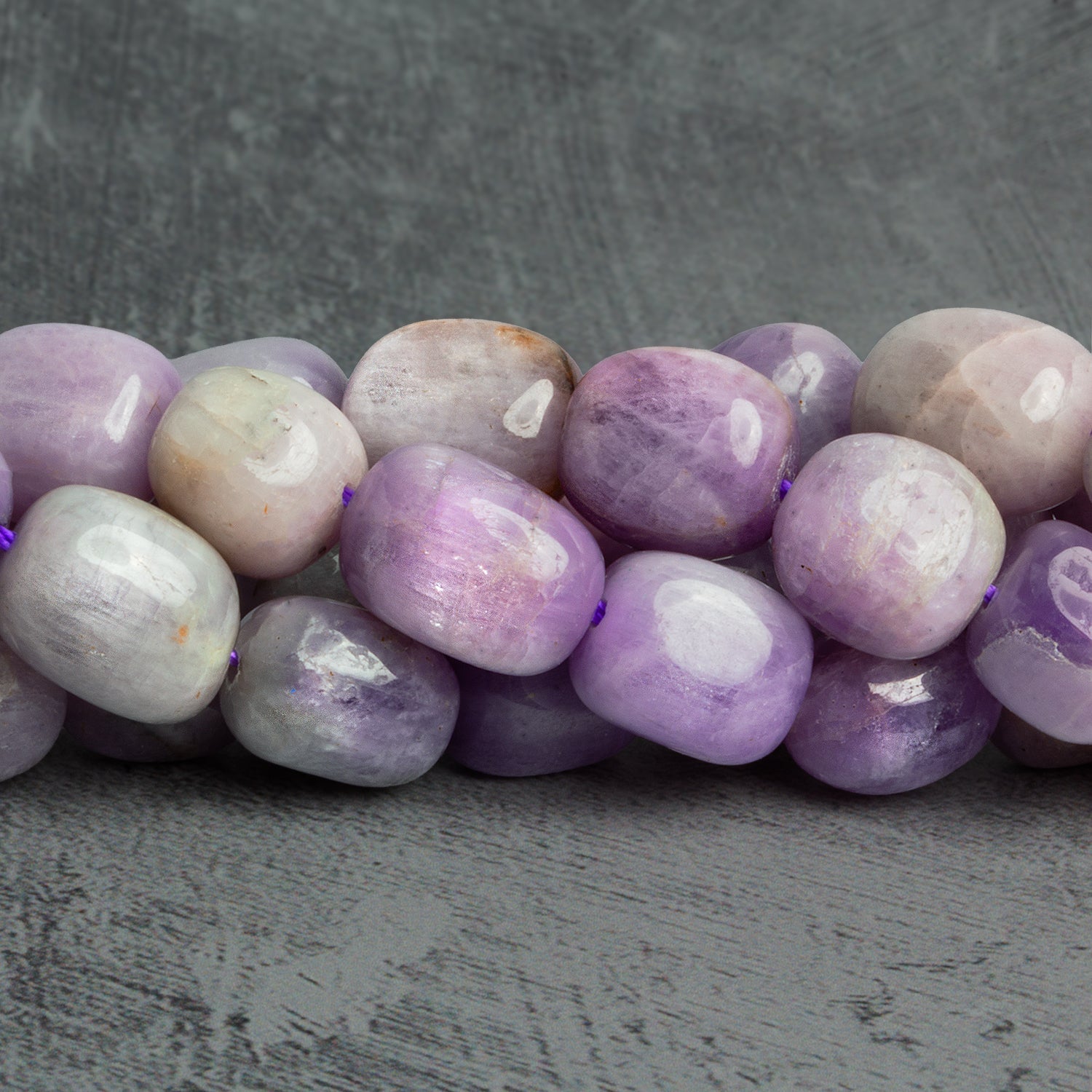 13x11mm Kunzite Plain Nuggets 16 inch 29 beads - The Bead Traders