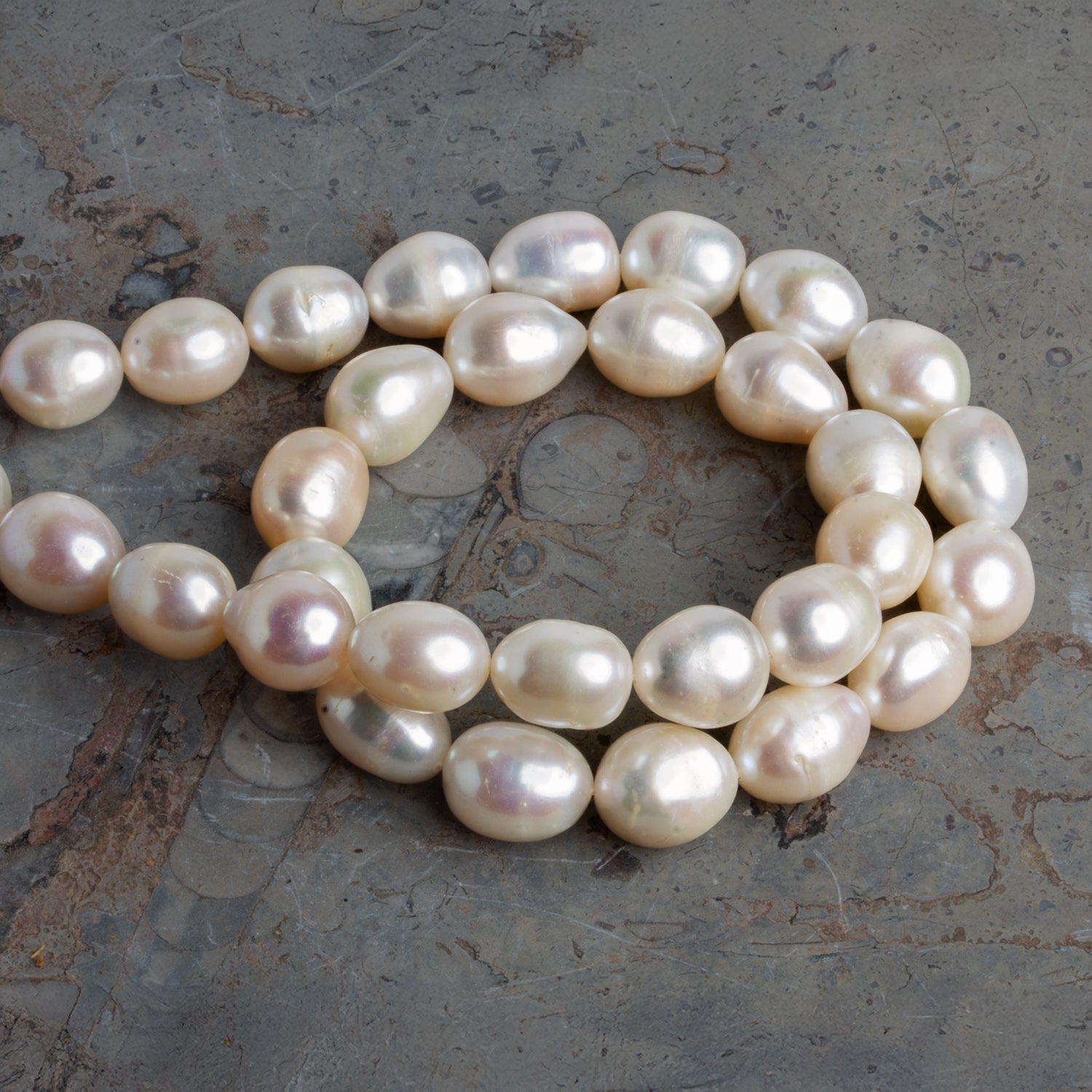 13x11mm White Oval Pearls 15 inch 30 beads - The Bead Traders
