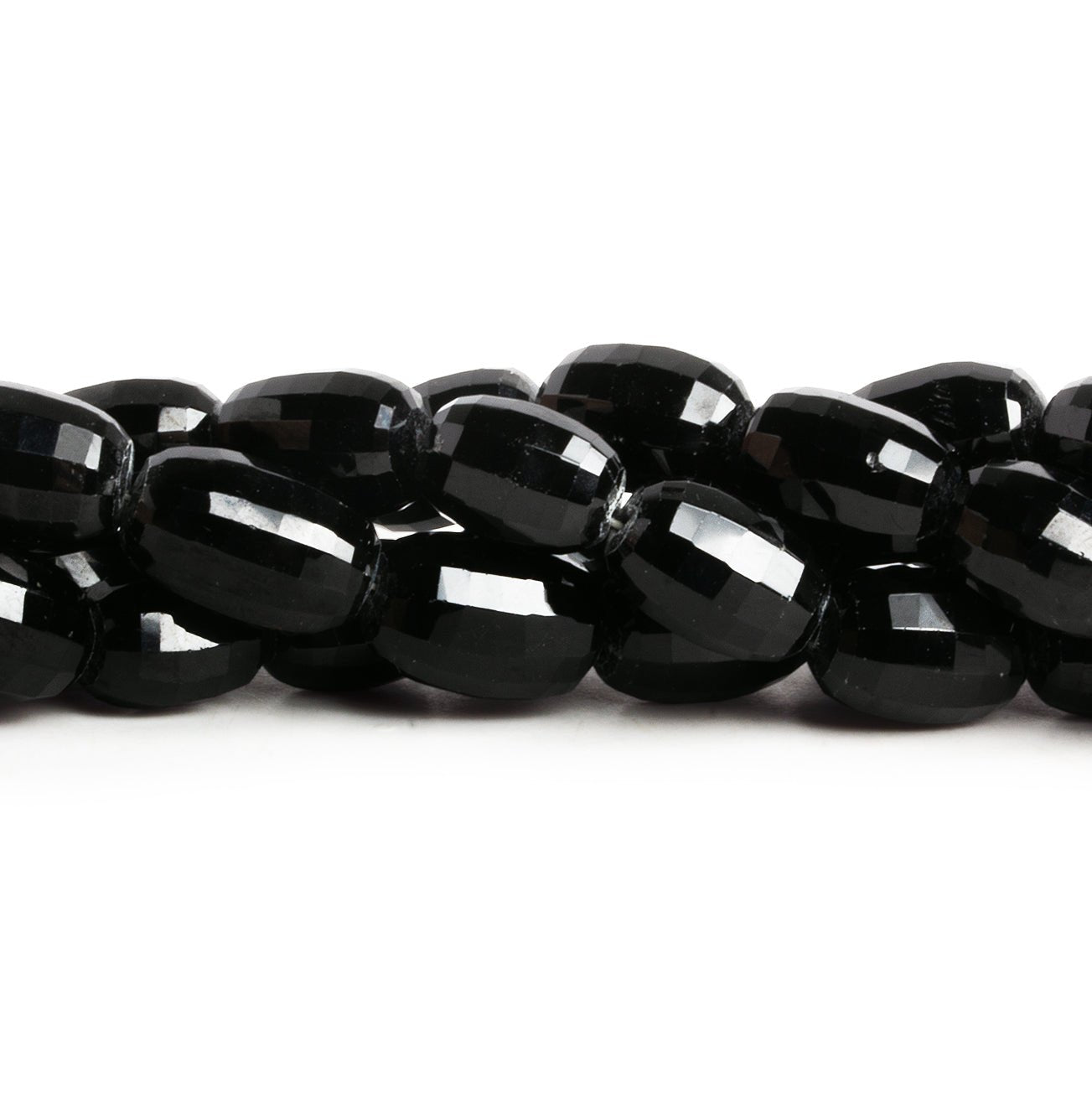 13x8mm Black Spinel Faceted Barrels 16 inch 38 beads - The Bead Traders