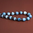 13x9mm Denim Opal Faceted Teardrops 7.5 inch 15 beads - The Bead Traders