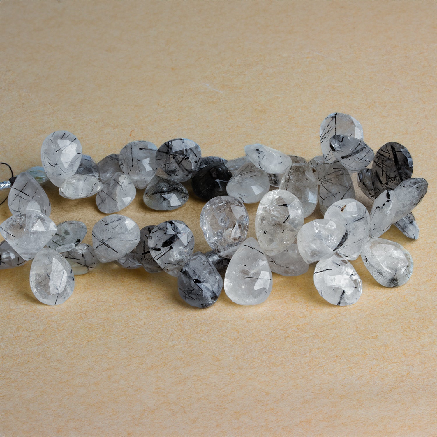 14x10mm Tourmalinated Quartz Faceted Pears 8 inch 40 beads - The Bead Traders
