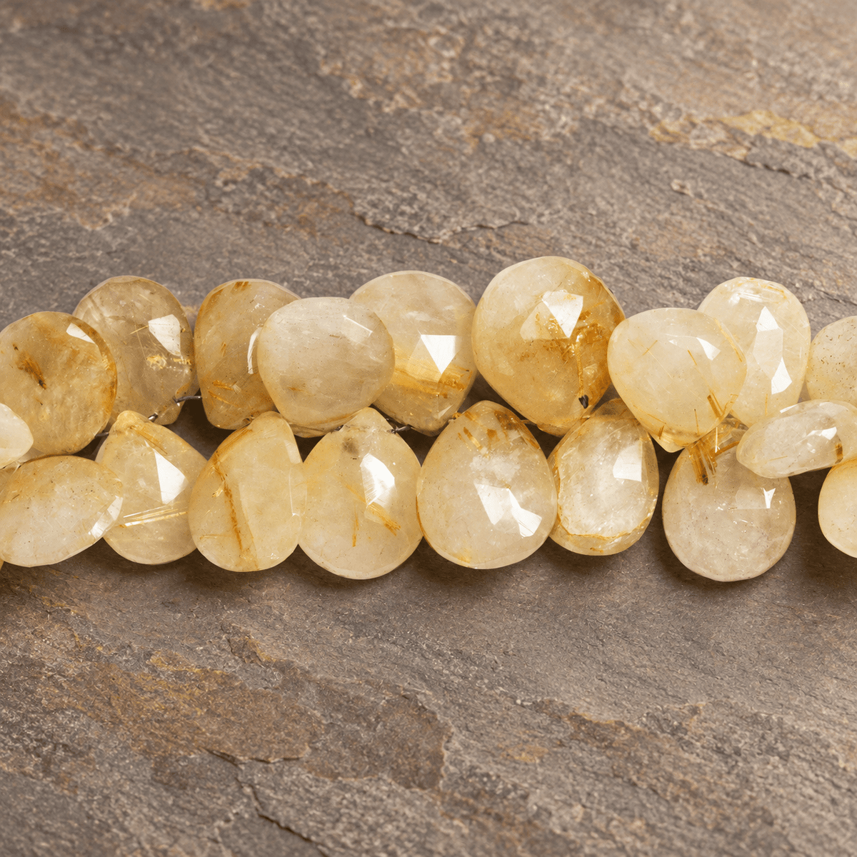 14x11mm Golden Rutilated Quartz Faceted Pears 8 inch 38 beads - The Bead Traders