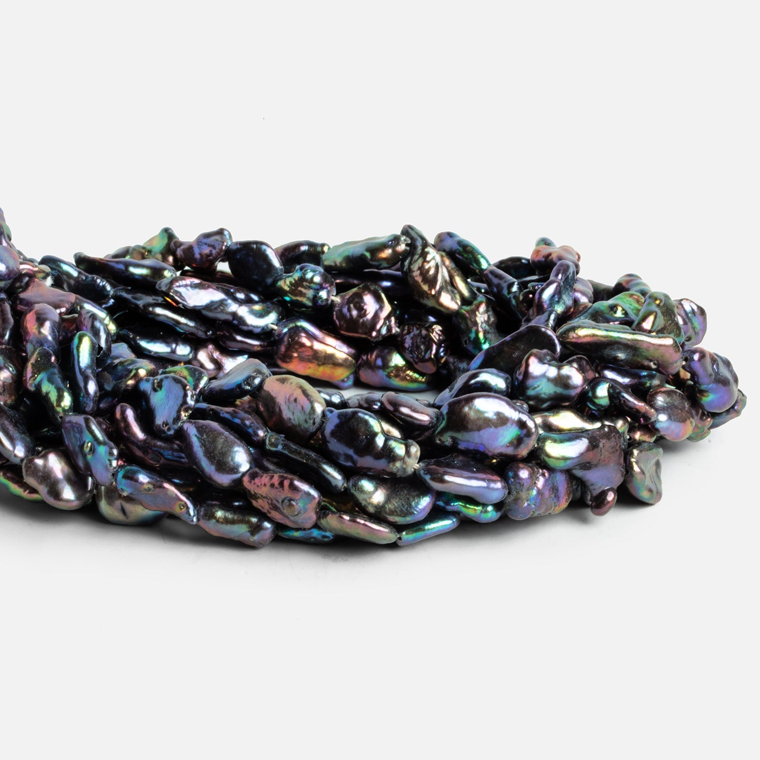 14x9mm Peacock Keshi Pearls 15 inch 24 beads - The Bead Traders