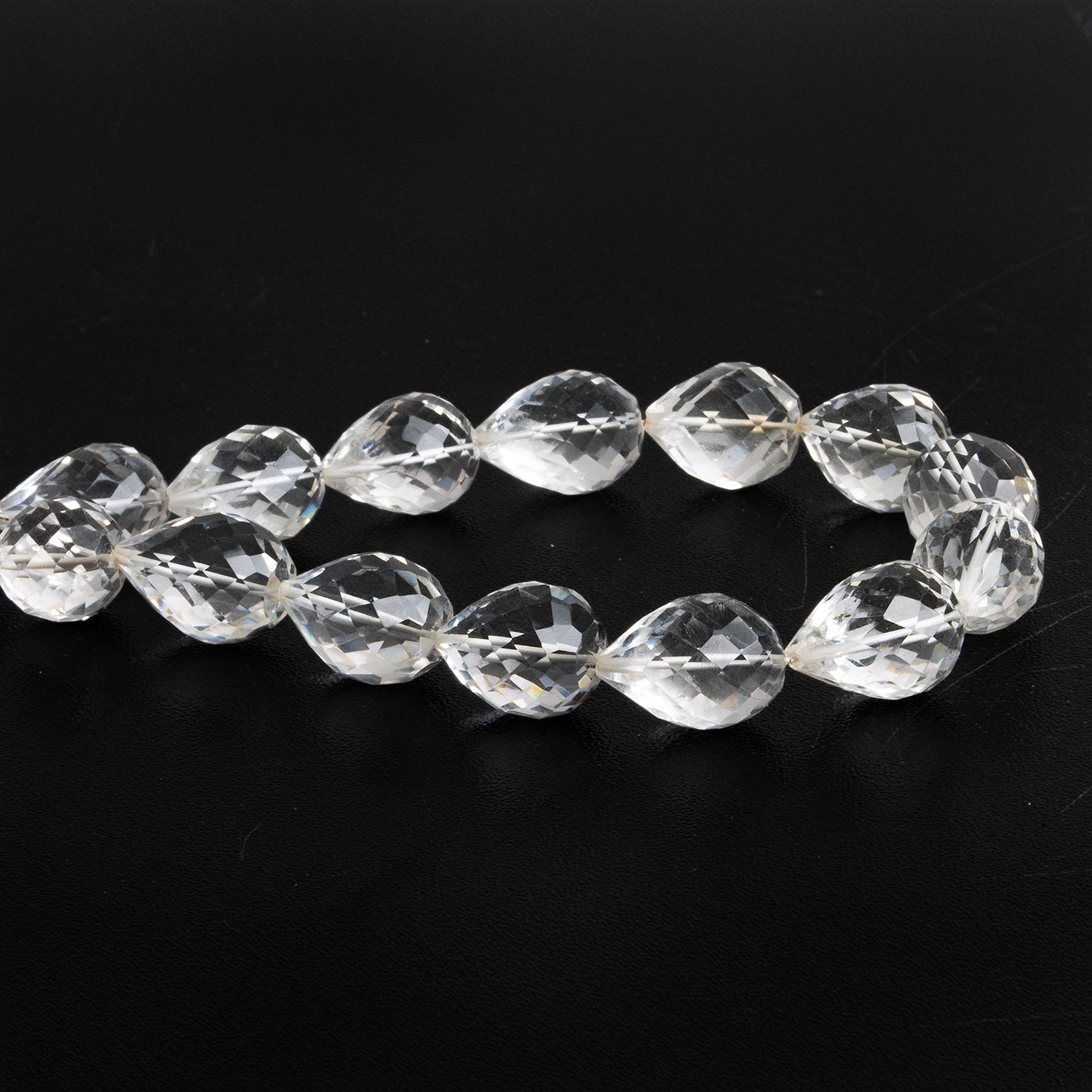 15x11mm Crystal Quartz Faceted Teardrops 9 inch 13 beads - The Bead Traders