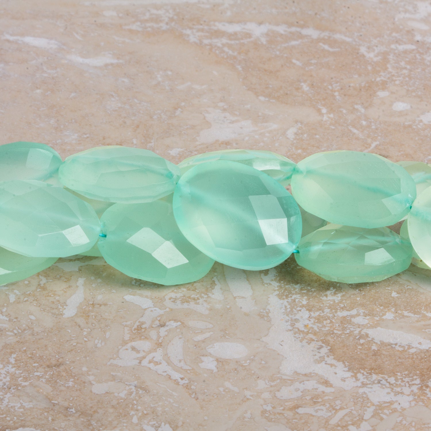 15x11mm Seafoam Chalcedony Faceted Ovals 7.5 inch 12 beads - The Bead Traders