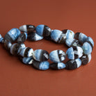 17x12mm Denim Opal Faceted Ovals 15 inch 25 beads - The Bead Traders