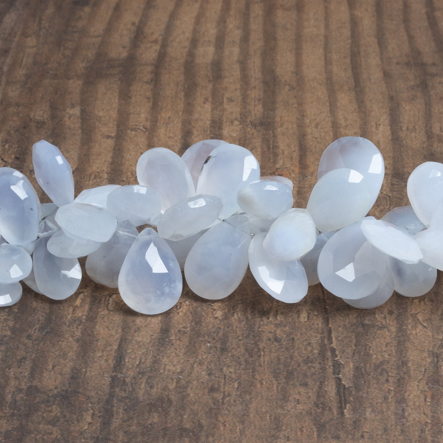 17x12mm Turkish Chalcedony Faceted Pears 7.5 inch 40 beads - The Bead Traders