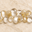 18x13mm Golden Rutilated Quartz Faceted Pears 7.5 inch 33 beads - The Bead Traders
