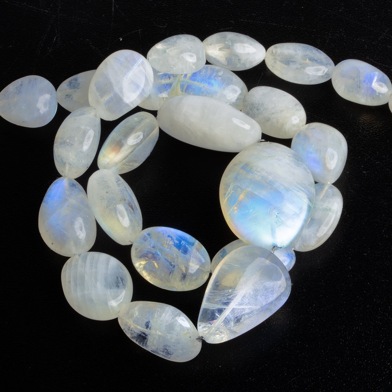 18x13mm Rainbow Moonstone Plain Nuggets 18 inch 25 beads - The Bead Traders