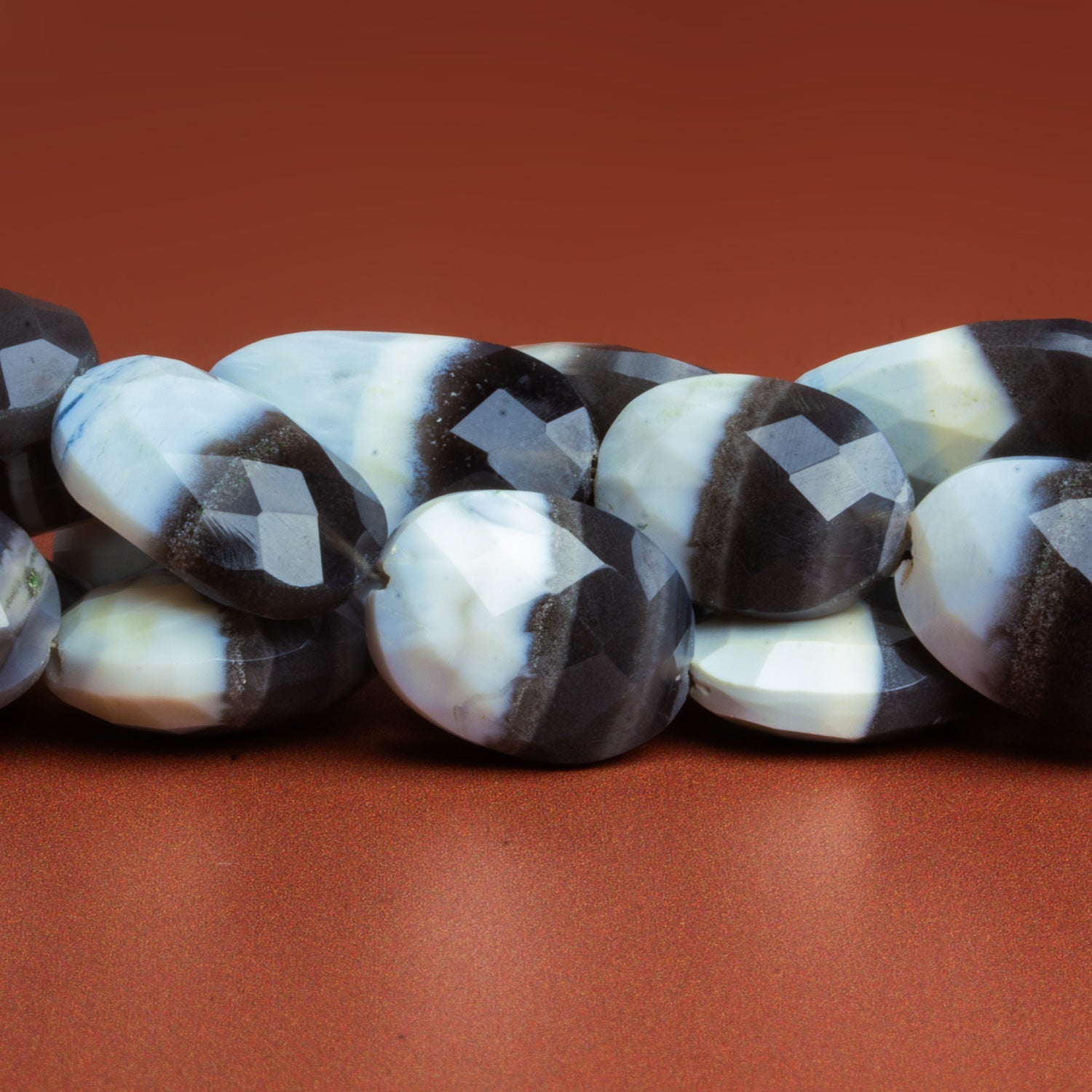 18x14mm Denim Opal Faceted Ovals 15 inch 19 beads - The Bead Traders