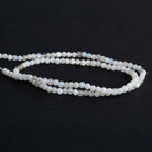 2 - 2.5mm Rainbow Moonstone Handcut Rounds 12 inch 120 beads - The Bead Traders