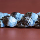21x16mm Denim Opal Faceted Ovals 15 inch 18 beads - The Bead Traders