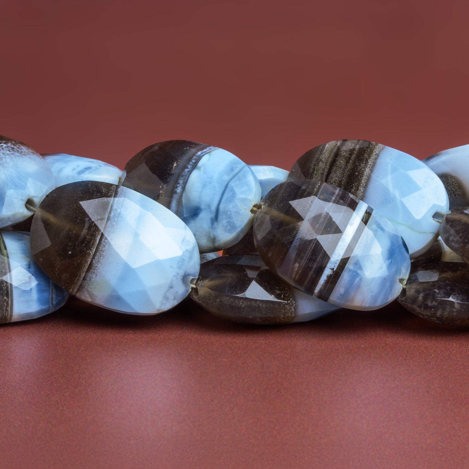 21x16mm Denim Opal Faceted Ovals 15 inch 18 beads - The Bead Traders