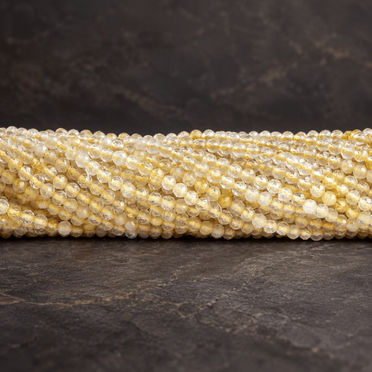 2.5mm Rutilated Quartz Micro Faceted Rounds 13 inch 140 beads - The Bead Traders