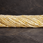 2.5mm Rutilated Quartz Micro Faceted Rounds 13 inch 140 beads - The Bead Traders