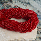 2mm Red Coral Rounds 16 inch 175 beads - The Bead Traders