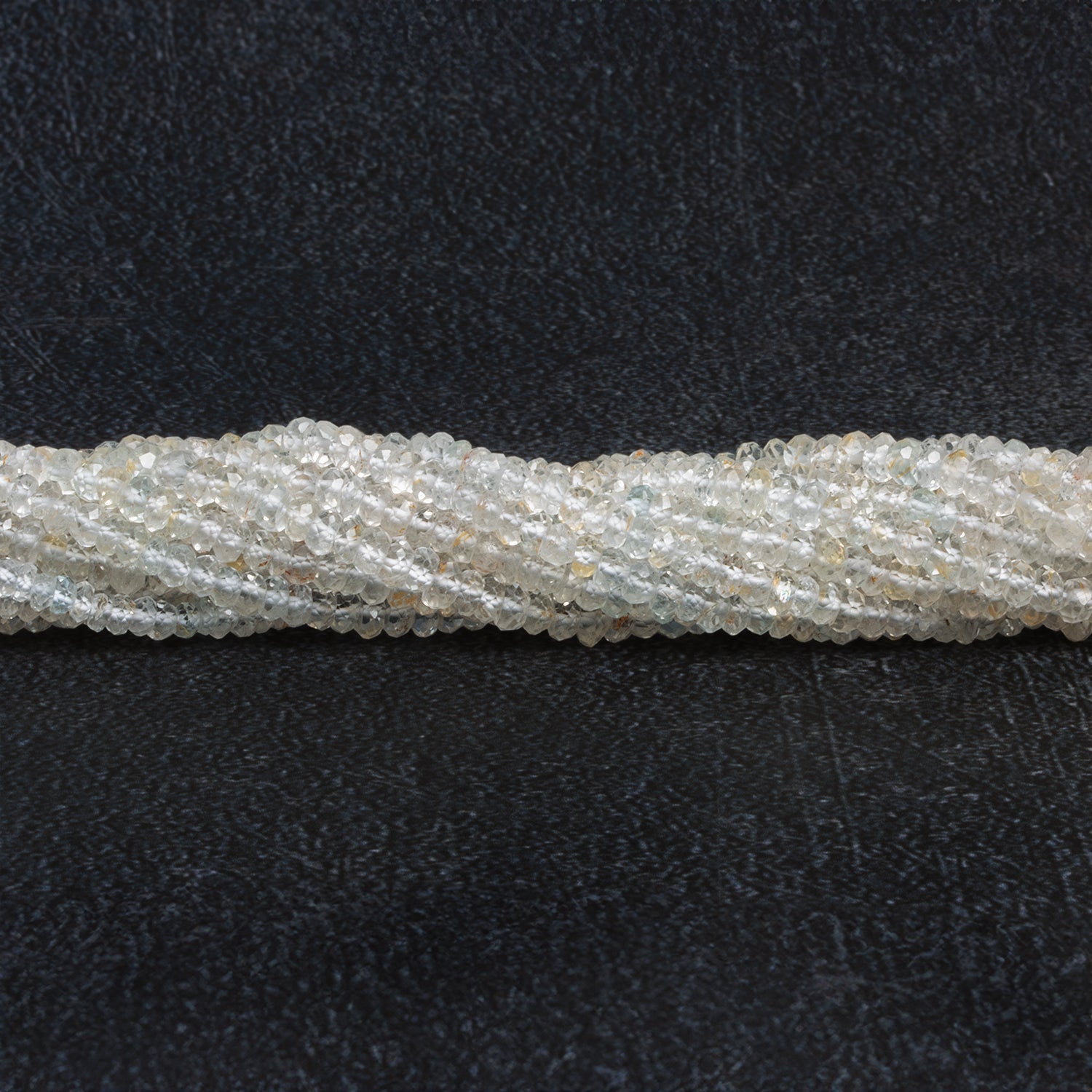 3-4mm White Topaz Handcut Rondelles 14 inch 135 beads - The Bead Traders