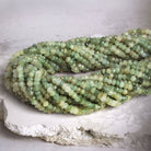 3.5 - 4mm Cat's Eye Green Quartz faceted rondelles 13 inch 125 beads - The Bead Traders