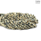 3.5-4mm Dalmatian Jasper 1mm Large Hole Faceted Rondelles 14 inch 125 beads - The Bead Traders