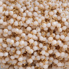 3mm Angel Skin Peach Crystal Gold Plated Dangling Chain by the foot 97 beads - The Bead Traders