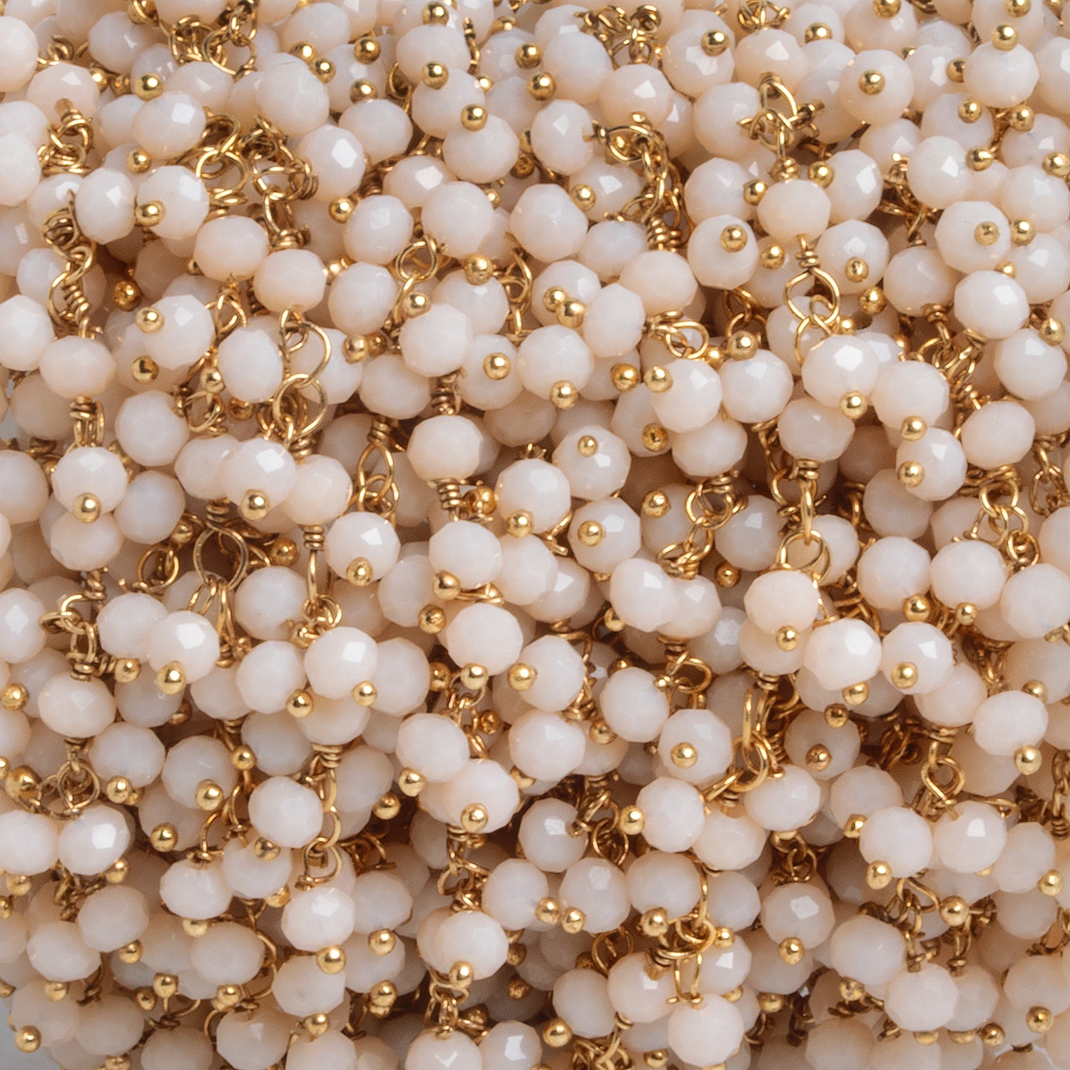 3mm Angel Skin Peach Crystal Gold Plated Dangling Chain by the foot 97 beads - The Bead Traders