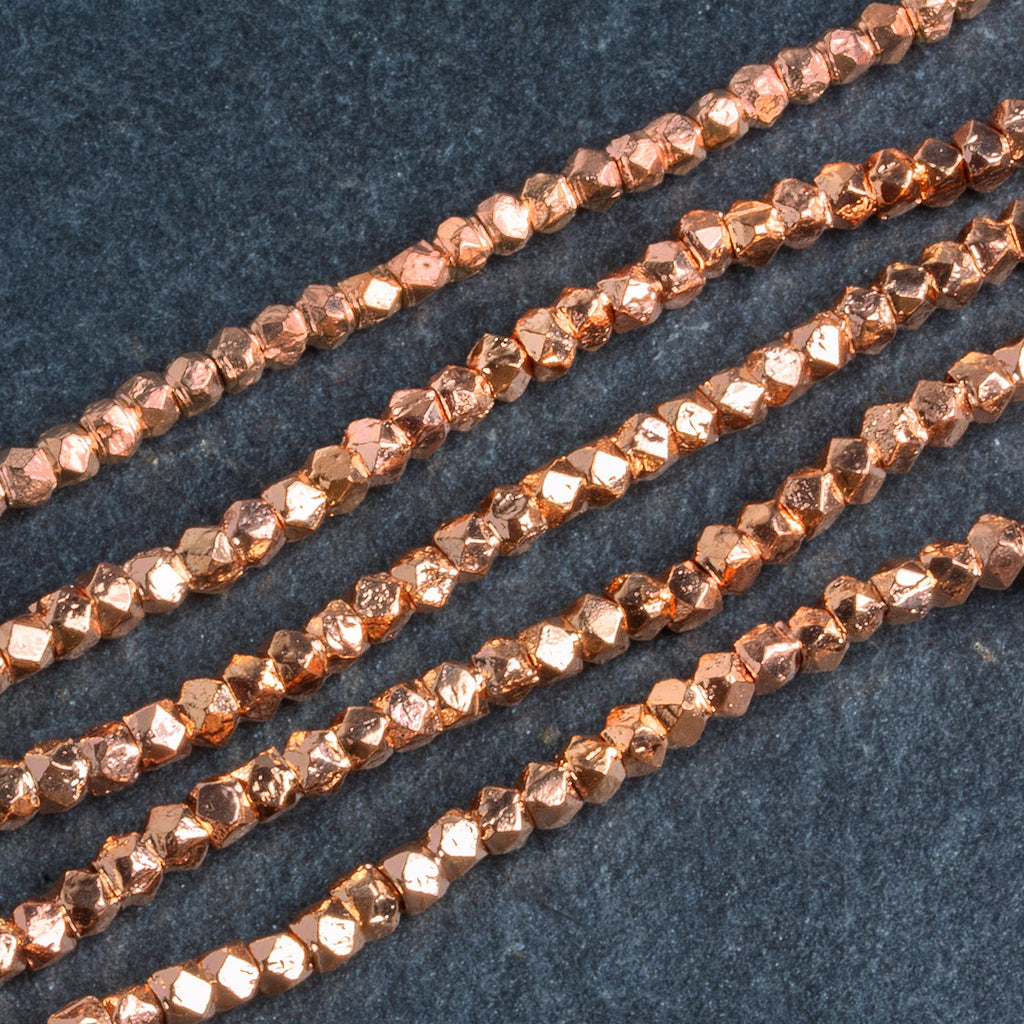 3mm Rose Gold Plated Copper Faceted Nuggets 8 inch 65 beads - The Bead Traders