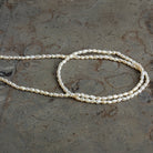 3x2mm Off White Baroque Rice Pearls 16 inch 95 beads - The Bead Traders