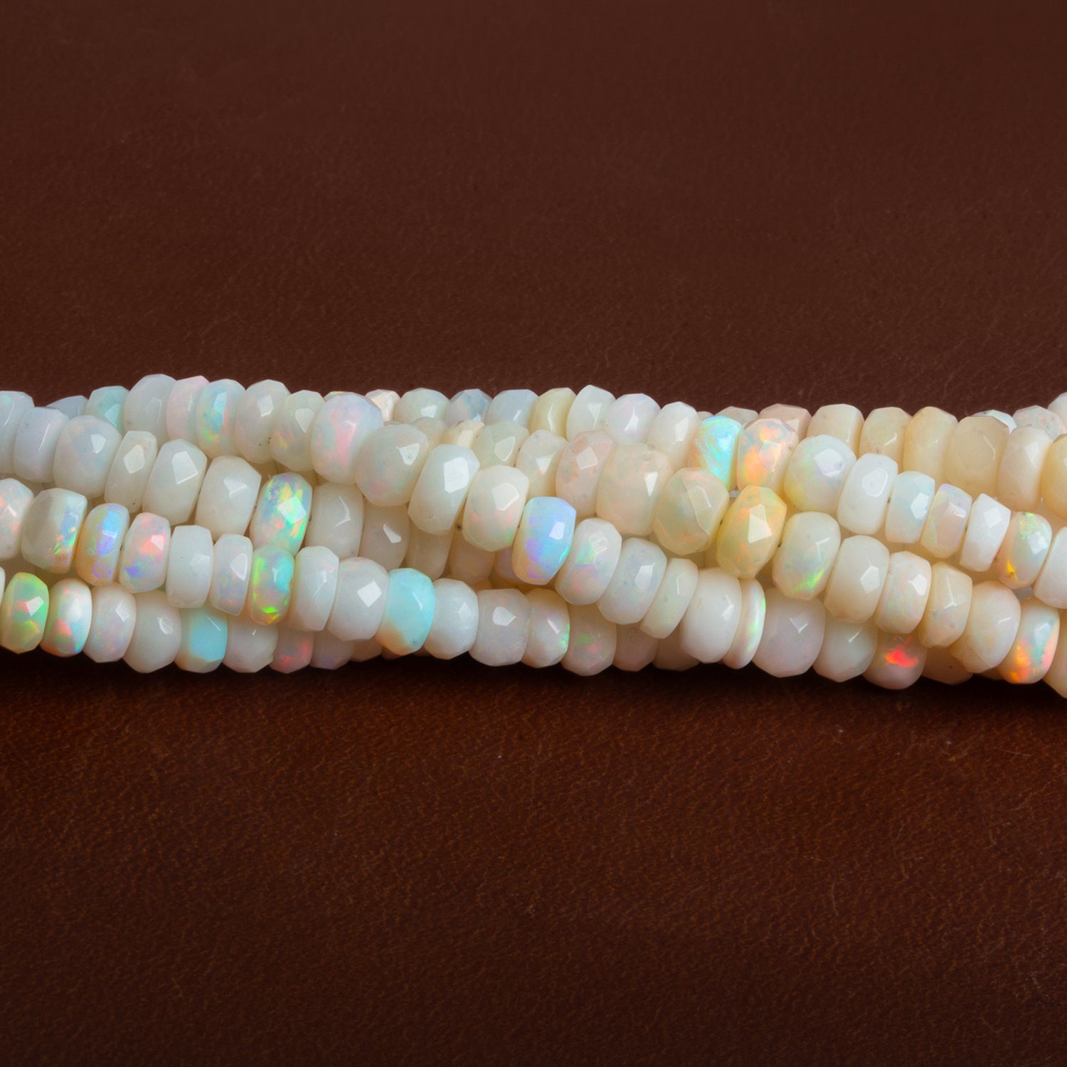 4-5mm Ethiopian Opal Faceted Rondelles 15 inch 160 beads - The Bead Traders