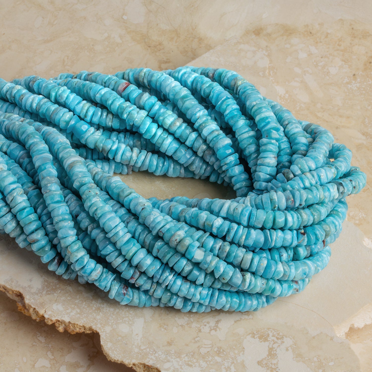 4 - 5mm Larimar Tumbled Heishis 12 inch 155 beads - The Bead Traders