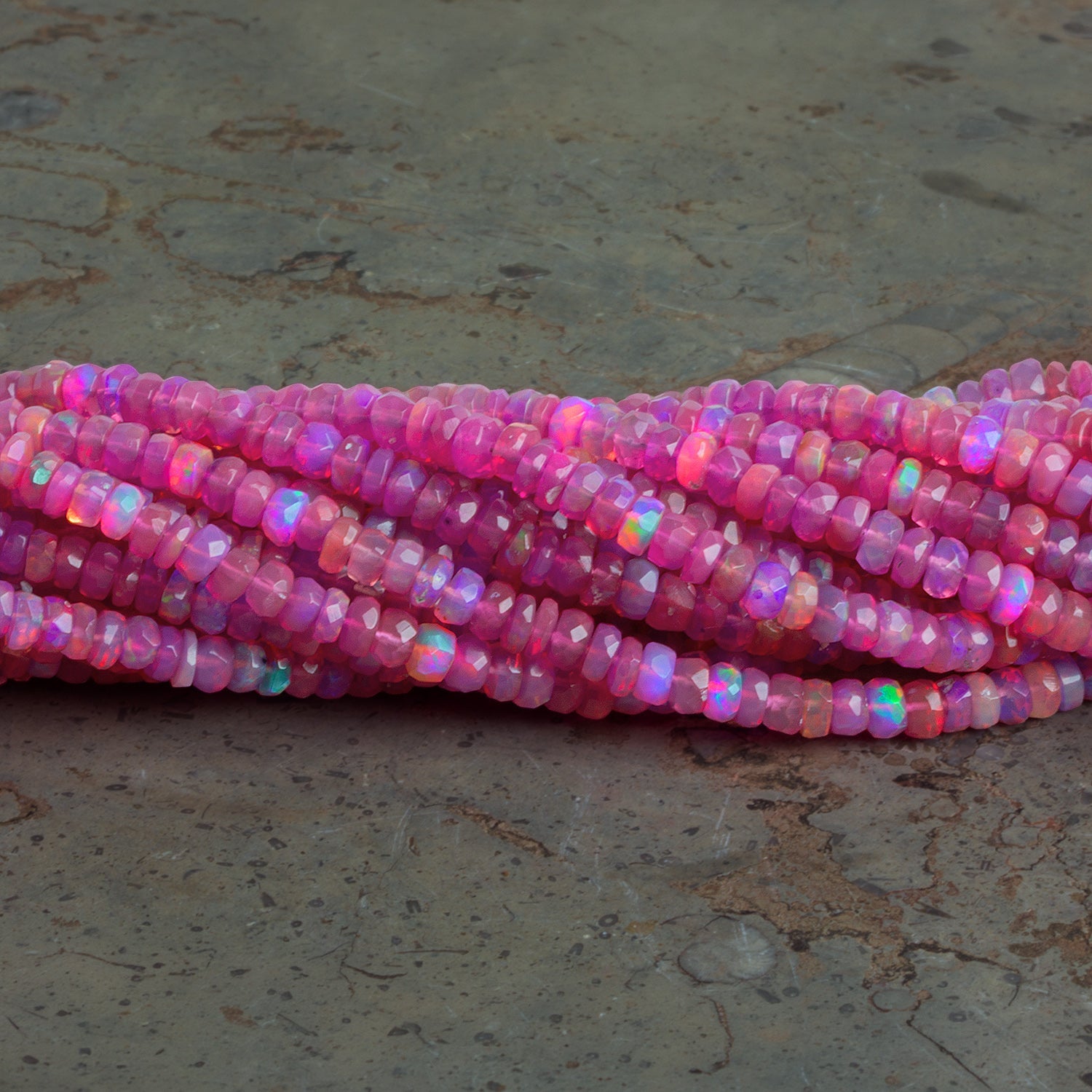 4 - 5mm Orchid Purple Ethiopian Opal Faceted Rondelles 16 inch 175 Beads AA - The Bead Traders