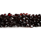4 - 6mm Garnet Faceted Hearts 7.5 inch 50 beads - The Bead Traders