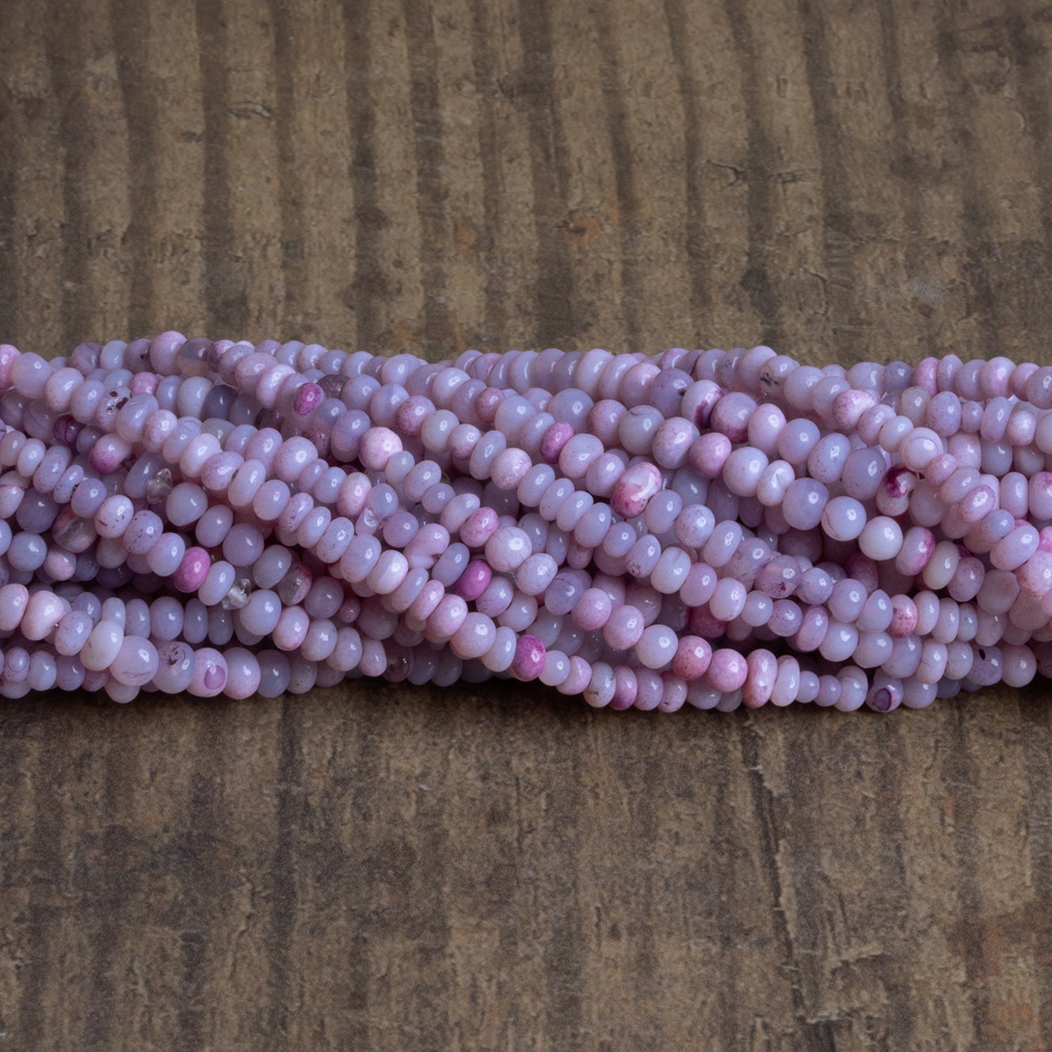 4.5mm Lavender Opal Plain Rondelles 16 inch 140 beads - The Bead Traders