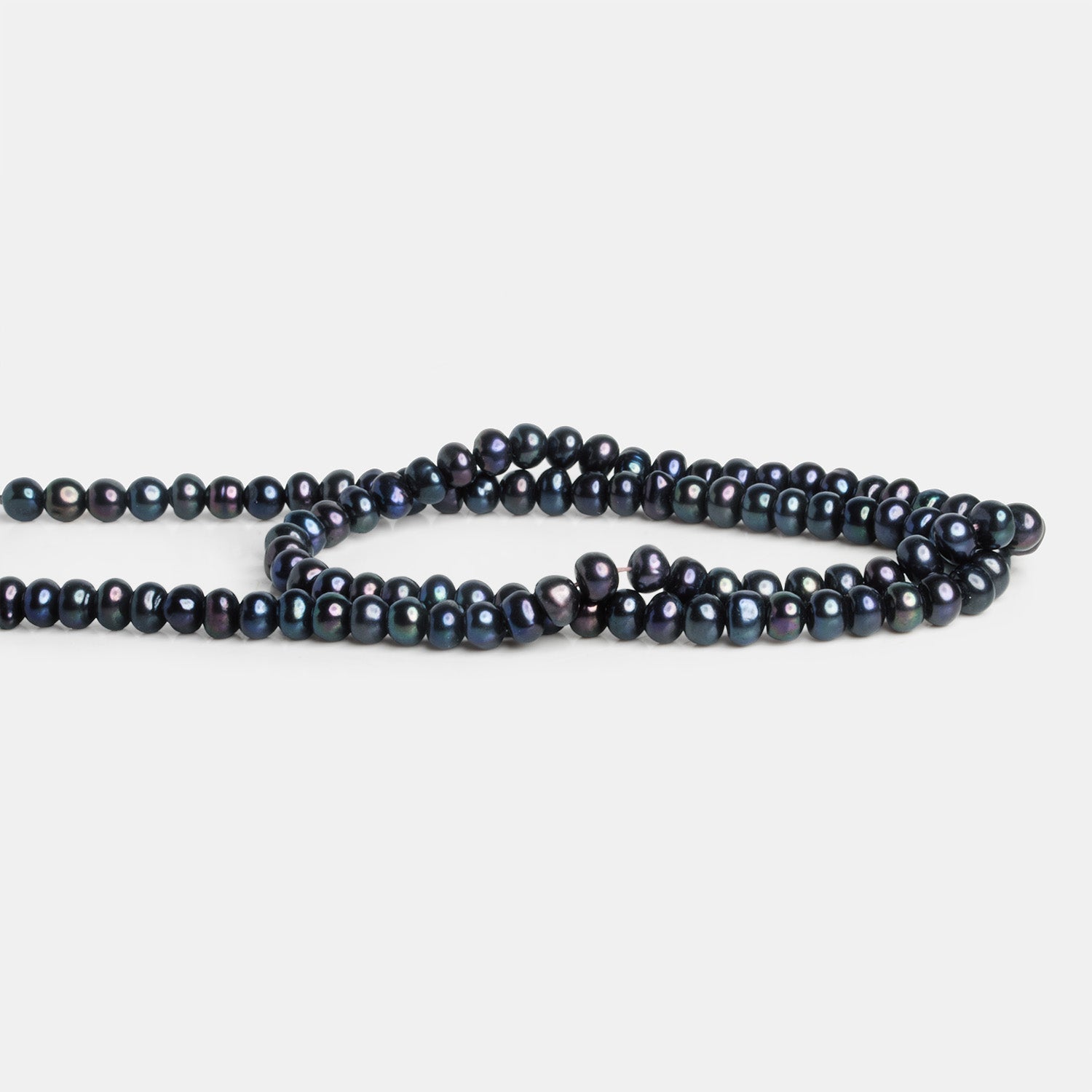 4.5mm Peacock Button Pearl 16 inch 110 beads - The Bead Traders