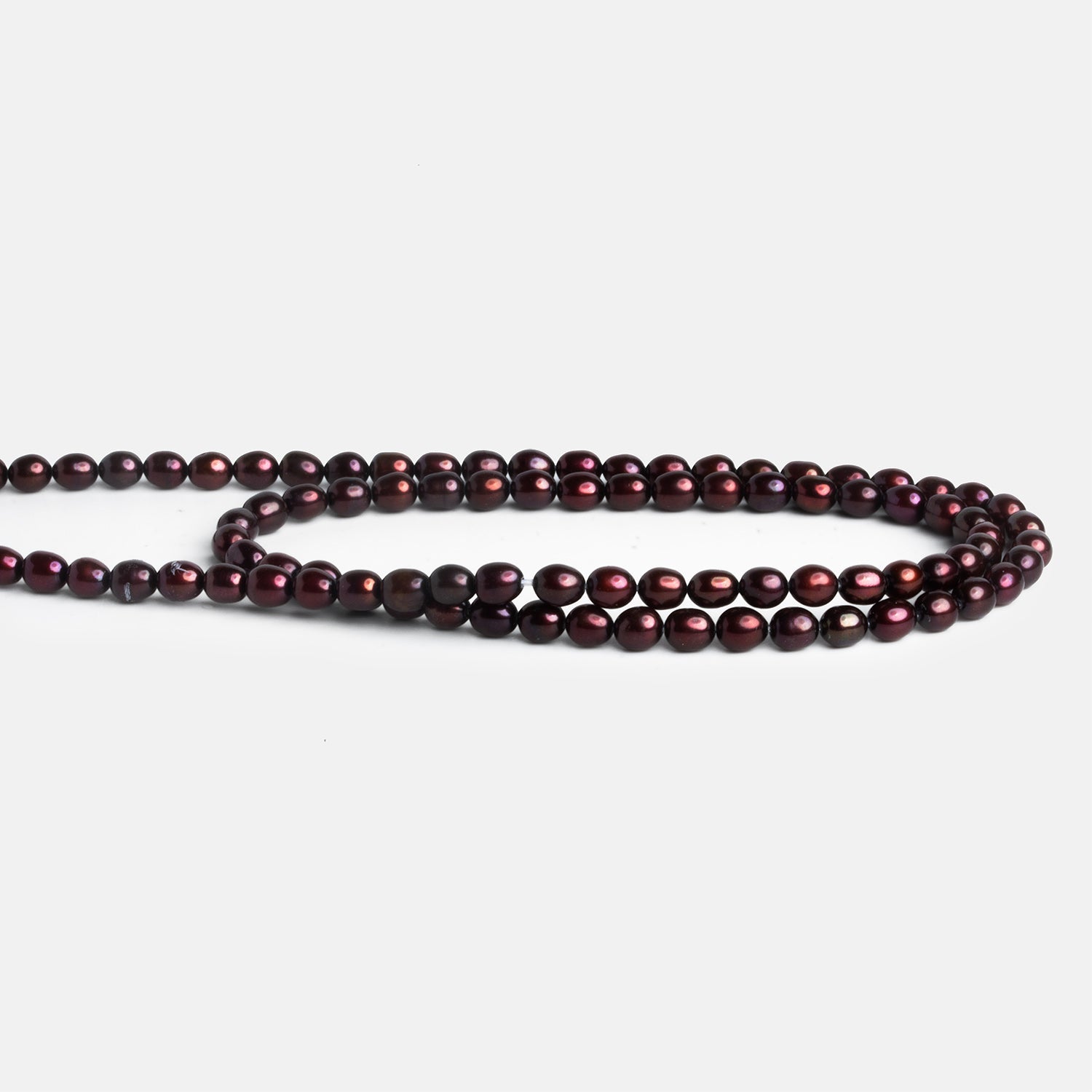 4.5x3.5mm Burgundy Straight Drilled Oval Pearls 16 inch 93 beads - The Bead Traders