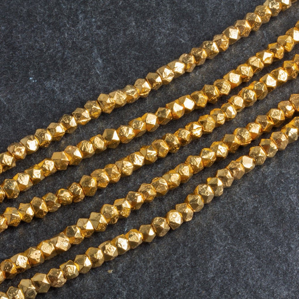 4mm 22kt Gold Plated Copper Faceted Cubes 8 inch 65 beads - The Bead Traders