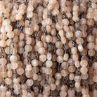 4mm Angel Skin Peach Moonstone Coin Trio Black Gold Chain 54 beads - The Bead Traders