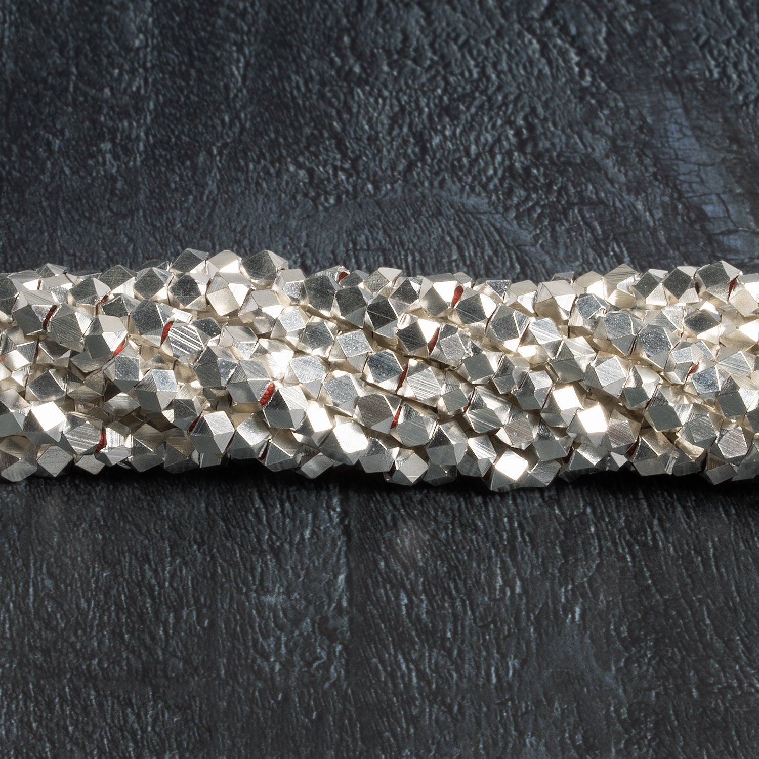 4mm Sterling Silver plated Copper Faceted Nuggets 8 inch 48 beads - The Bead Traders