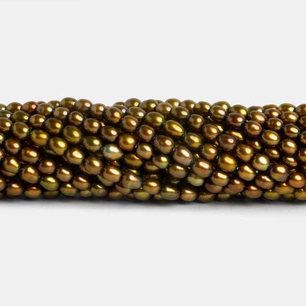 4x3.5mm Pistachio Oval Pearls 15 inch 85 beads