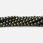 4x3mm Mushroom Green Oval Pearls 15 inch 72 beads - The Bead Traders