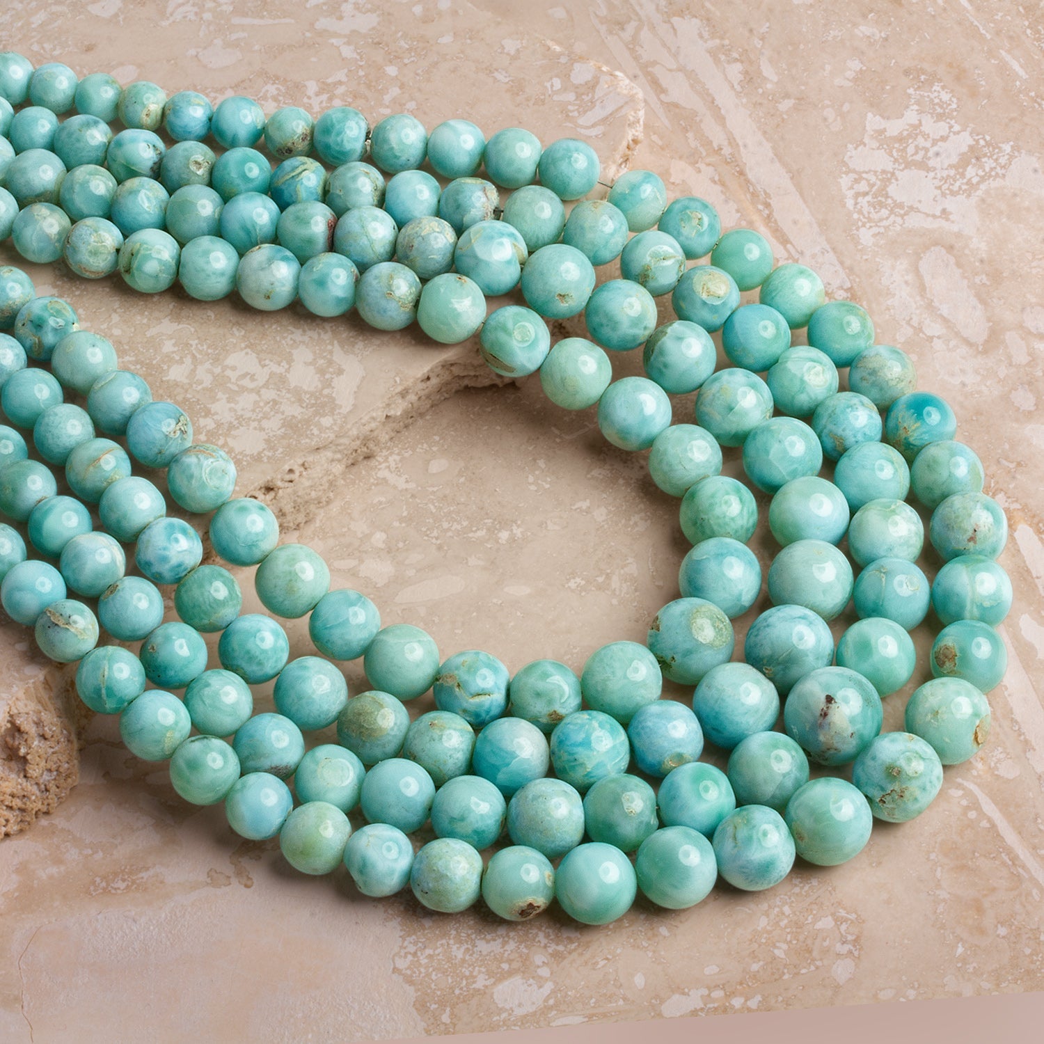 5 - 10mm Larimar Plain Rounds 16 inch 70 beads - The Bead Traders