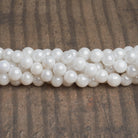 5-6.5mm Mystic Quartz Plain Rounds 16 inch 63 beads - The Bead Traders