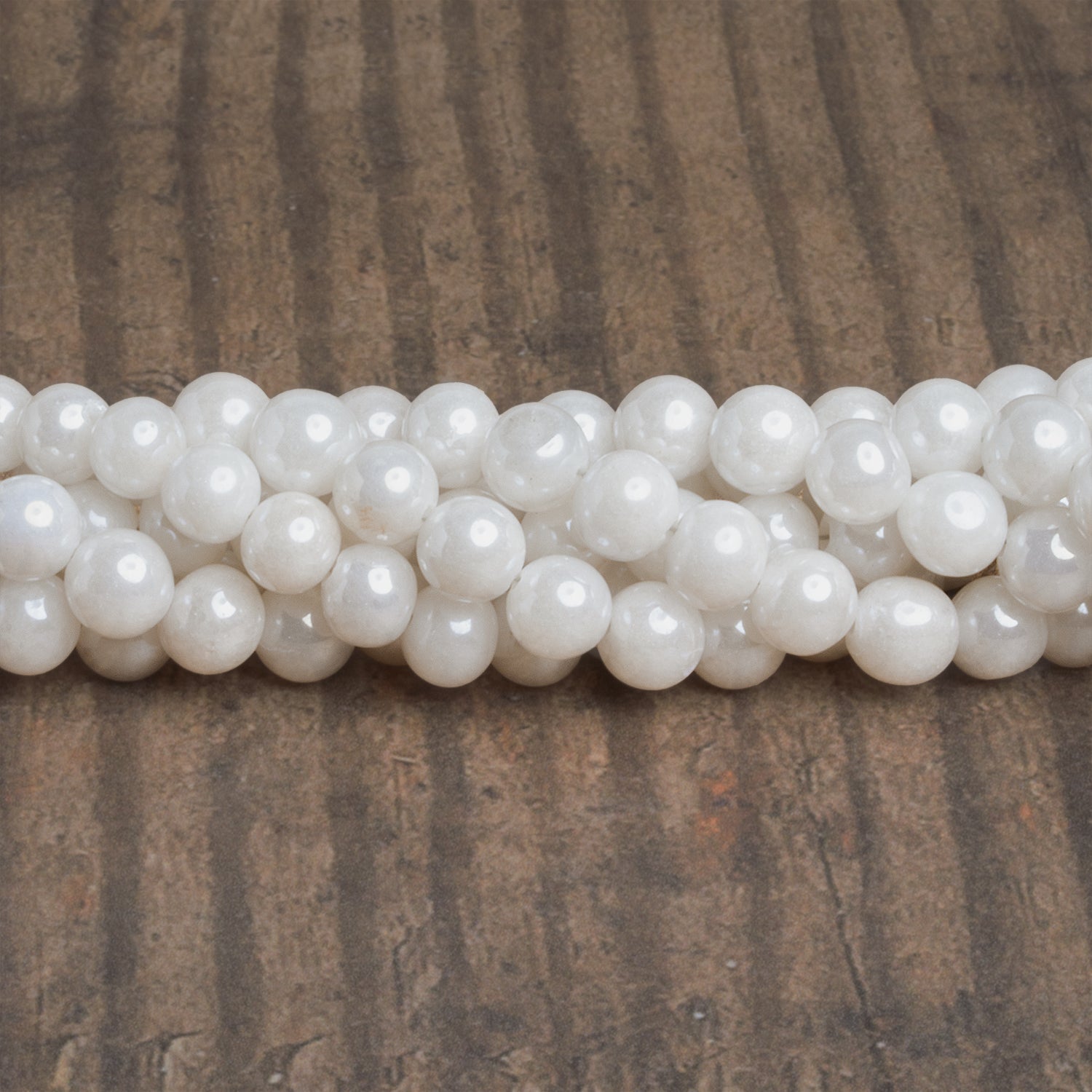 5-6.5mm Mystic Quartz Plain Rounds 16 inch 63 beads - The Bead Traders