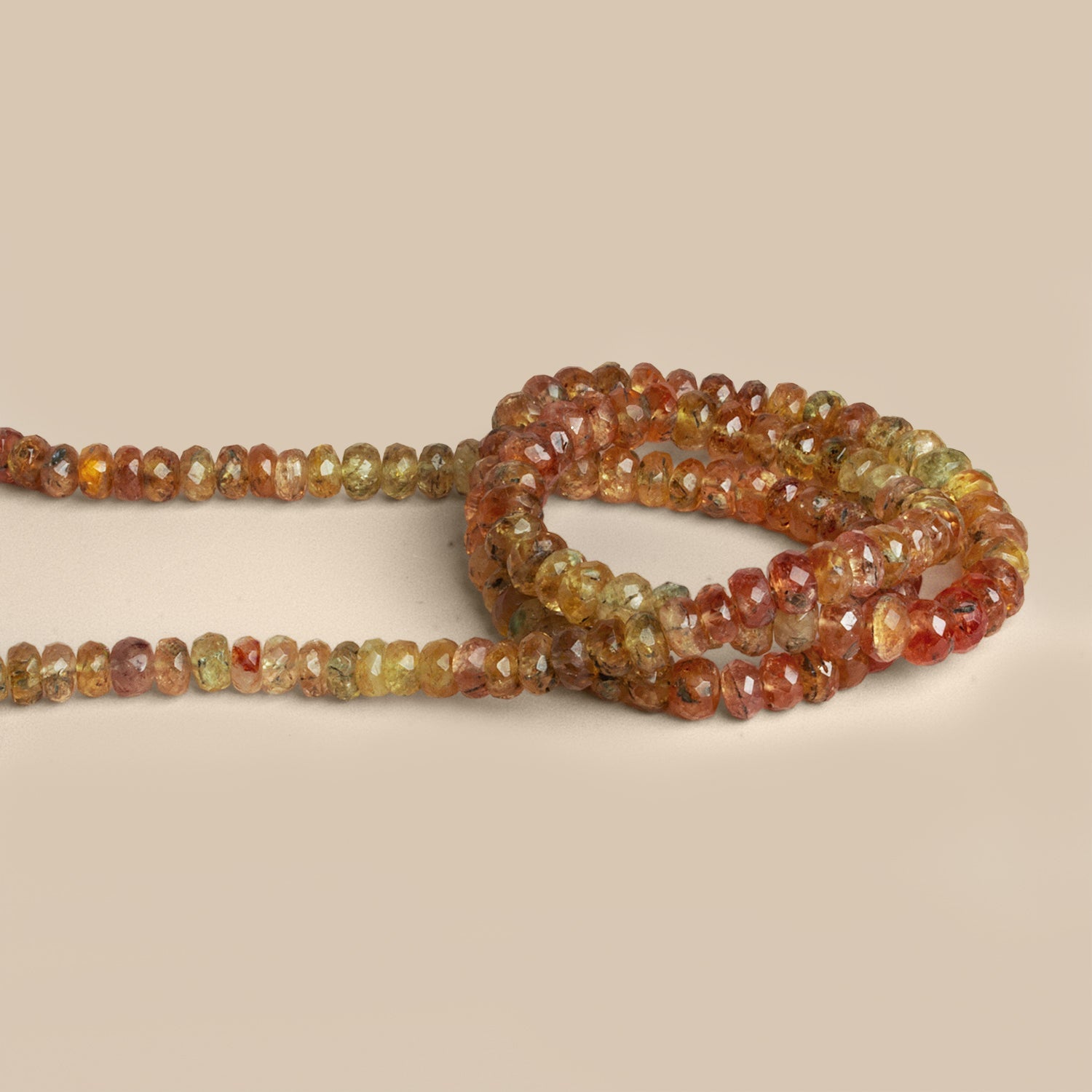 5 - 6mm Imperial Topaz Faceted Rondelles 18 inch 130 beads - The Bead Traders