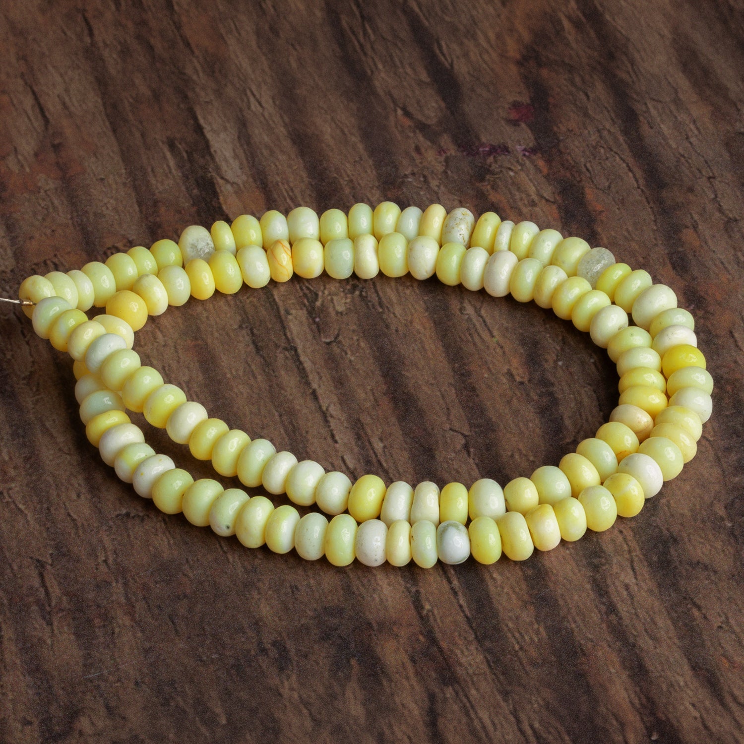 5 - 6mm Lemon Yellow Opal Plain Rondelles 16 inch 110 beads - The Bead Traders