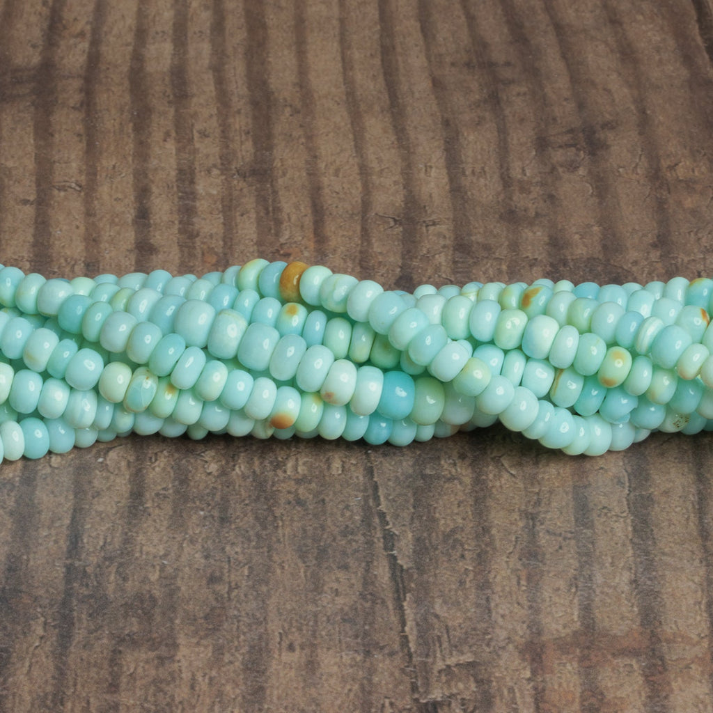 5-6mm Light Blue Opal Plain Rondelles 16 inch 95 beads - The Bead Traders