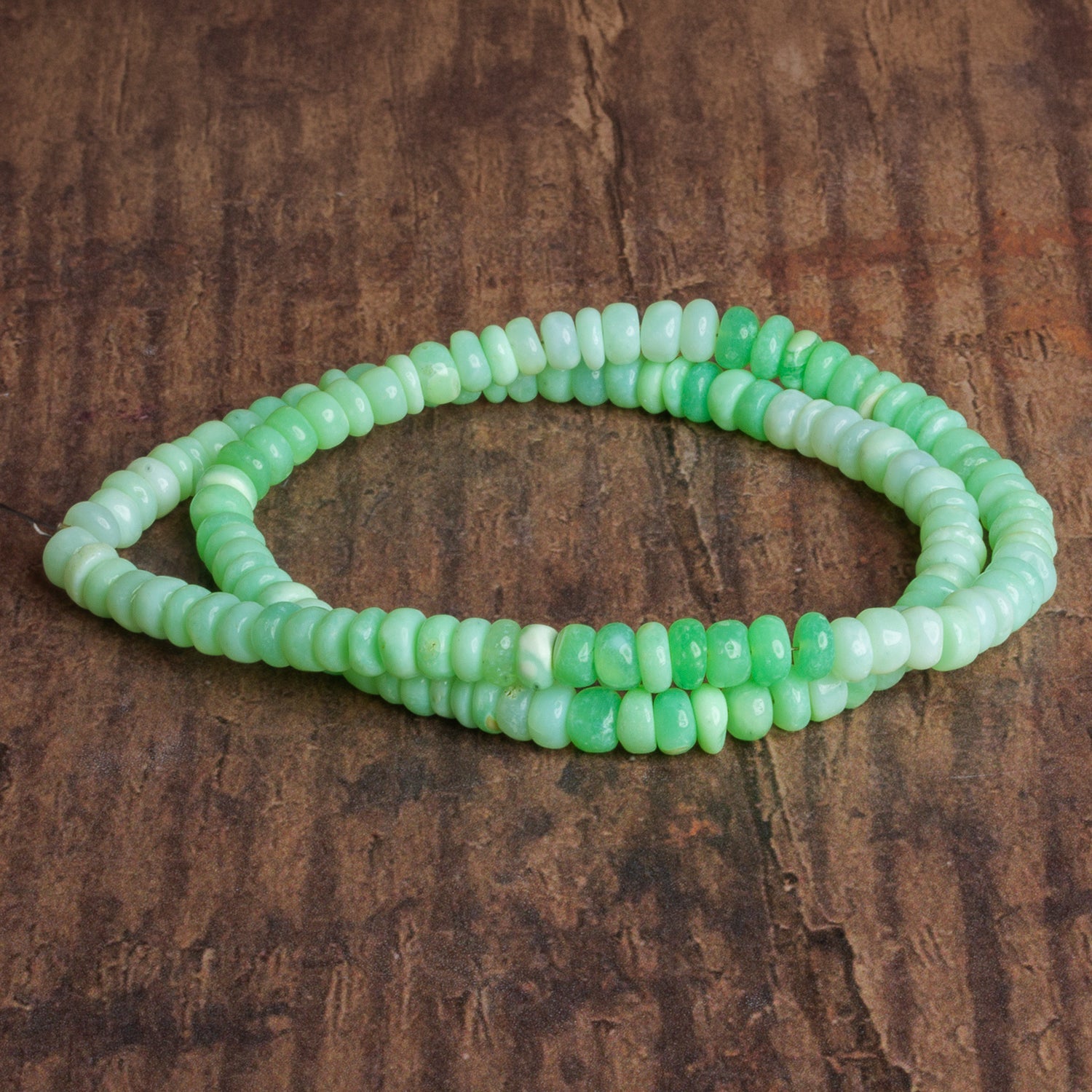 5 - 6mm Mint Green Opal Plain Rondelles 16 inch 120 beads - The Bead Traders