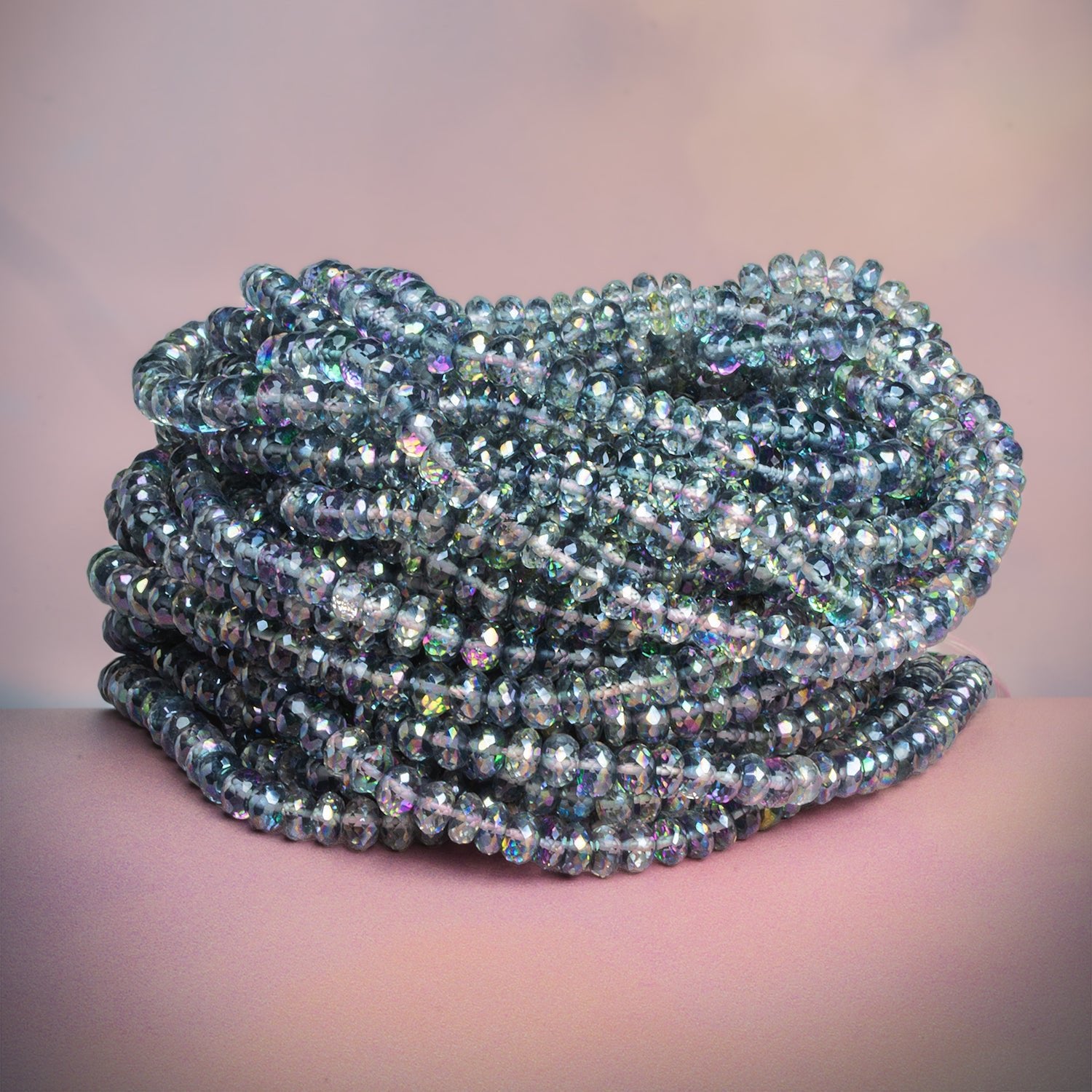 5 - 6mm Mystic Blue Topaz Faceted Rondelles 16 inch 125 beads - The Bead Traders