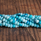 5 - 7mm Blue Opal Plain Rondelles 16 inch 80 beads - The Bead Traders