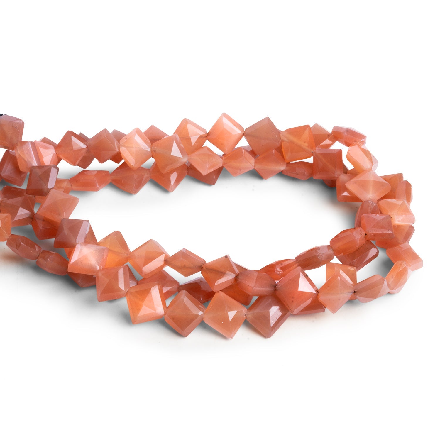 5 - 7mm Peach Moonstone Kites 8 inch 28 beads - The Bead Traders