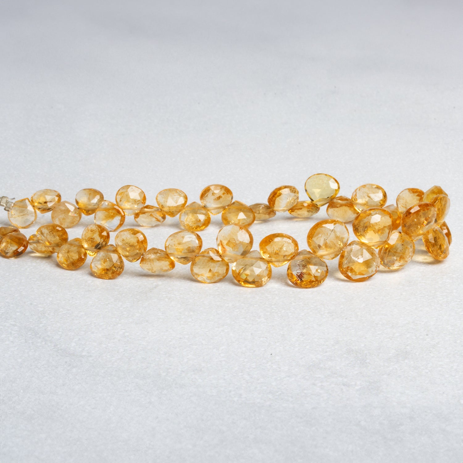 5 - 8mm Citrine Faceted Hearts 9 inch 45 beads - The Bead Traders
